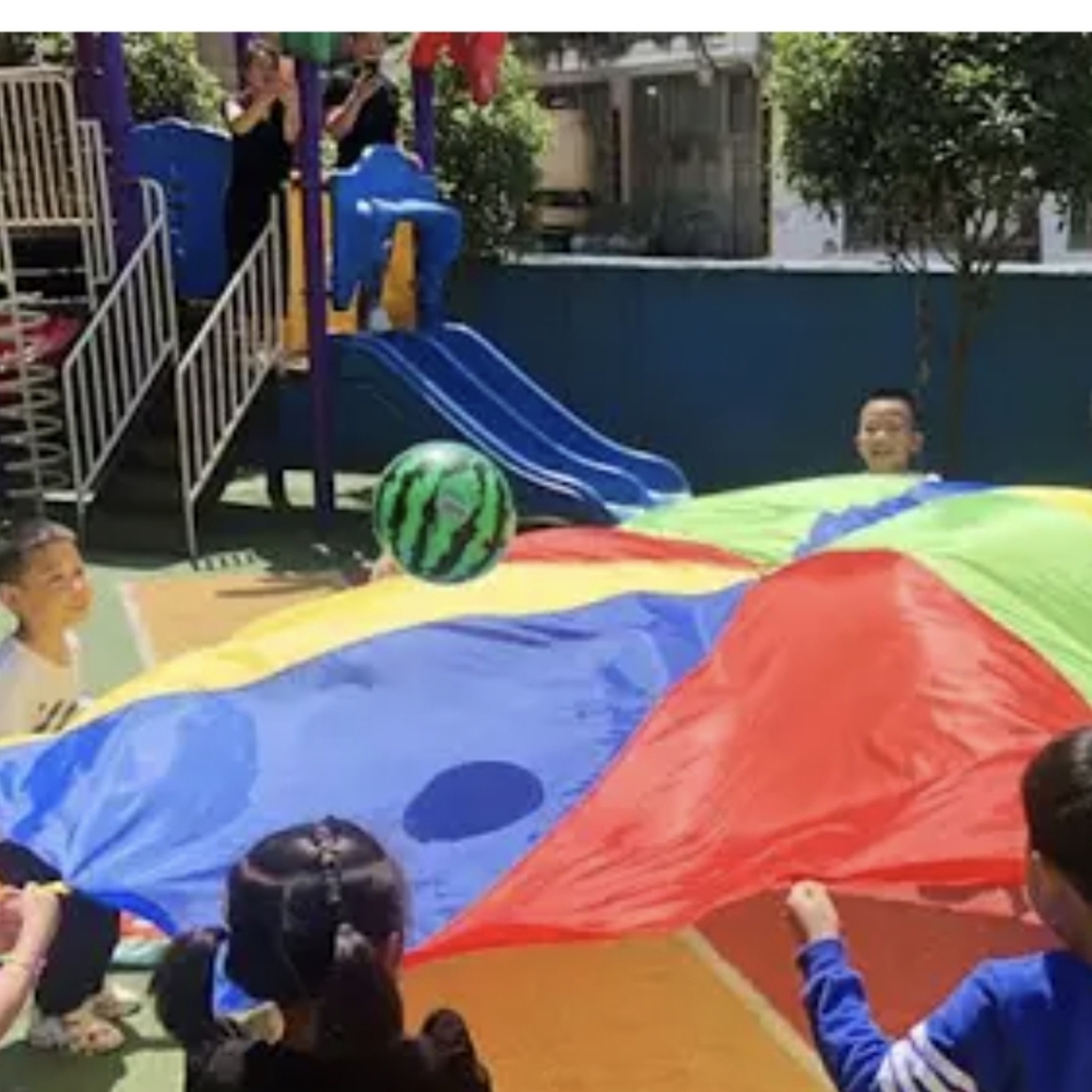 Parachute for group Activities. Made of heavy duty  cloth. 6 Handles